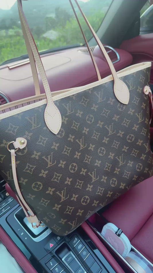 Louis Vuitton Neverfull tote bag.